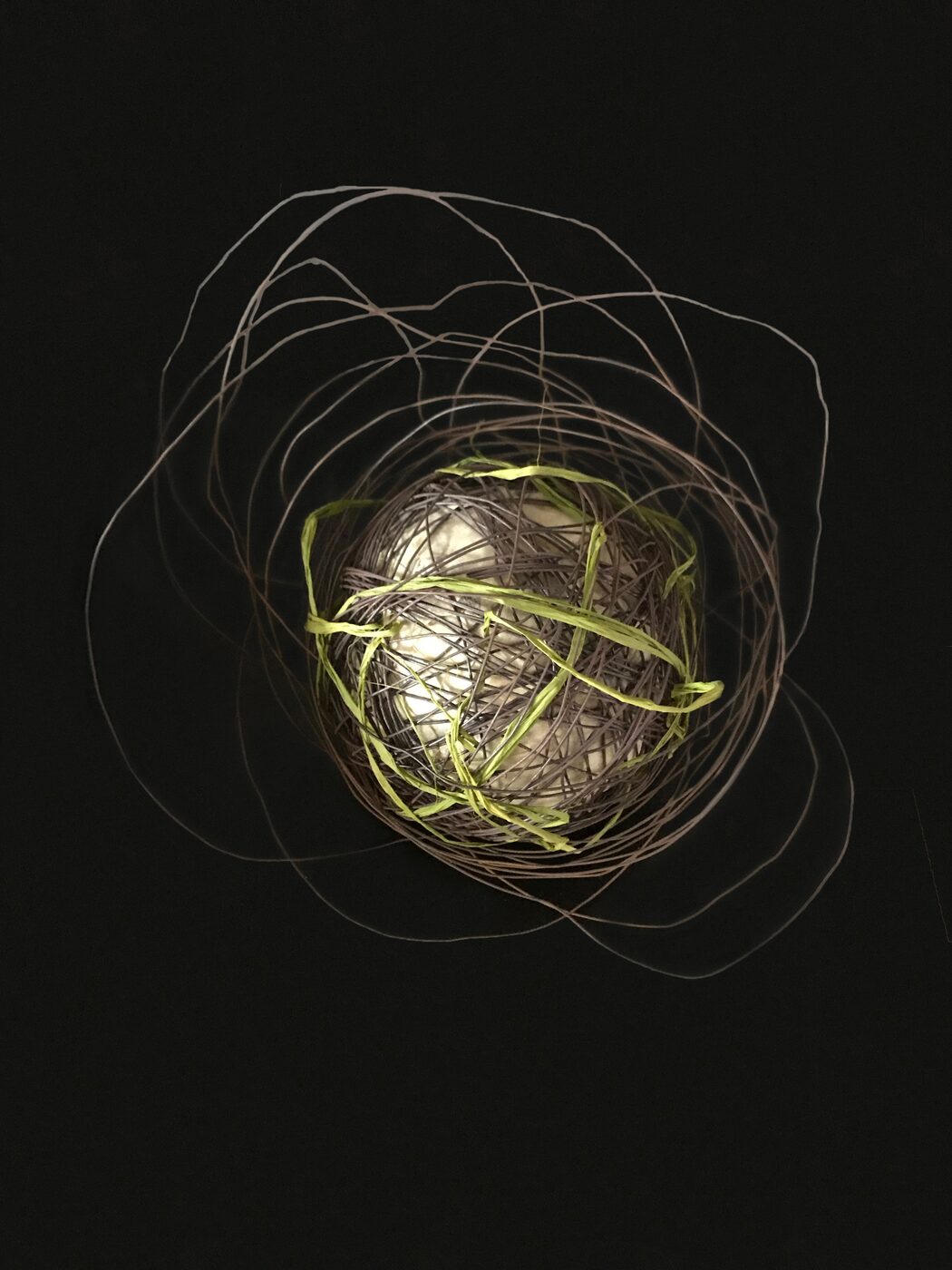 Boule, repeated forms arranged across the floor
